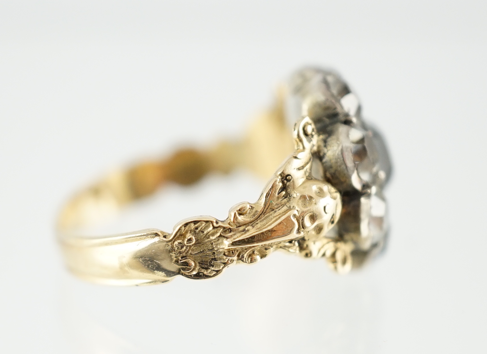 A Georgian, gold, silver and paste set cluster ring